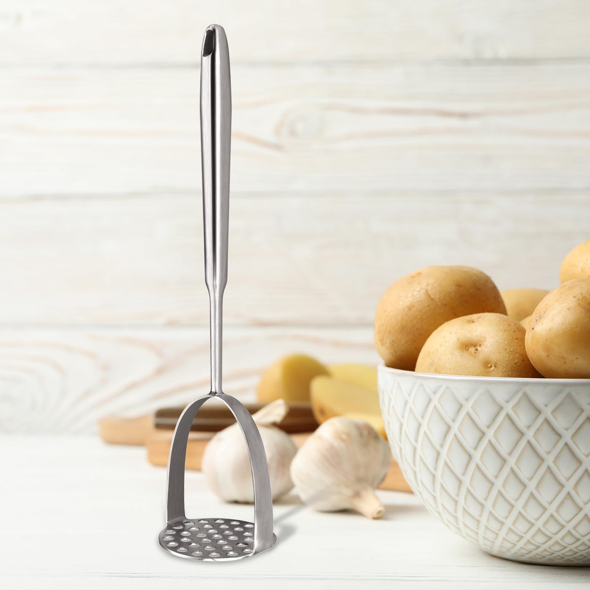 MACIFECI slotted serving spoon drains liquids while serving.