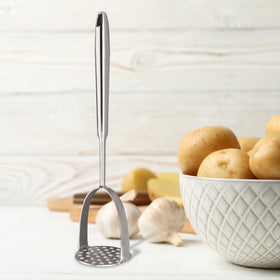 MACIFECI slotted serving spoon drains liquids while serving.