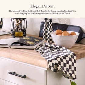 Mackenzie-Childs Courtly Check cotton towel adds decorative warmth to hands and dishes.