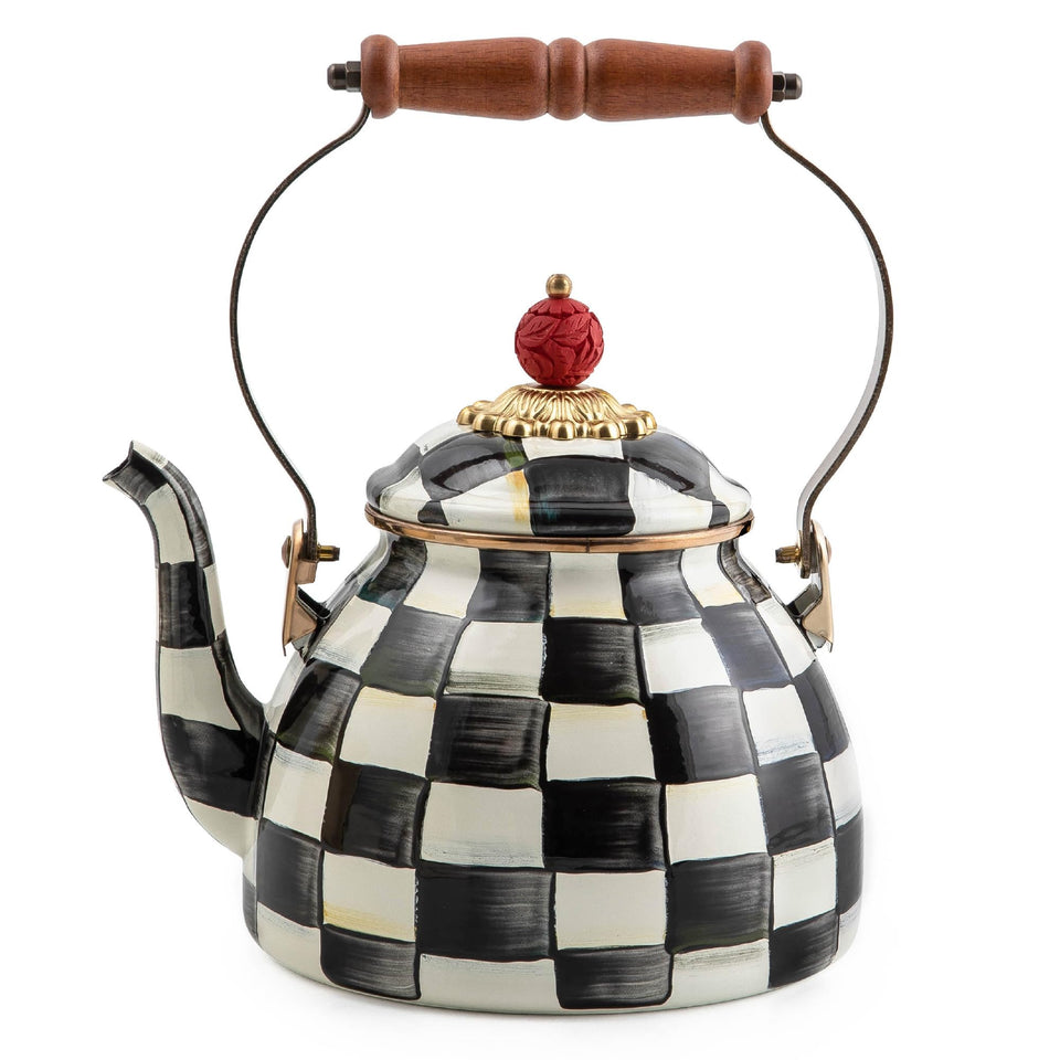 MACKENZIE-CHILDS enamel tea kettle Courtly Check base on stove, stylish focal point.