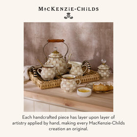 MACKENZIE-CHILDS durable heavy-gauge steel underbody built for daily use.