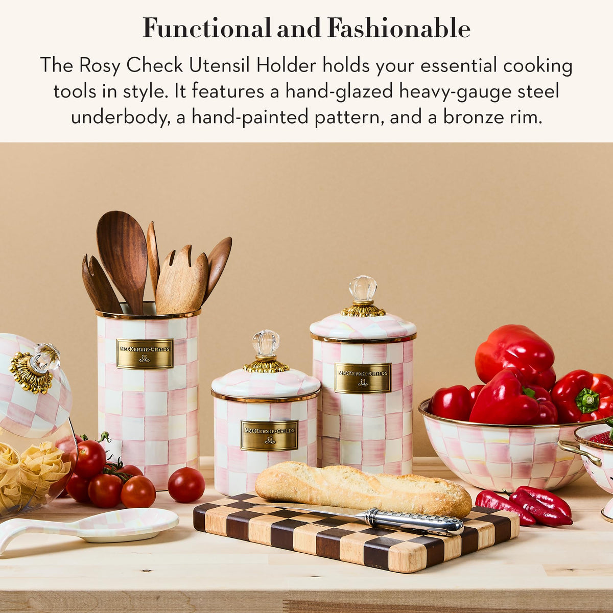 MACKENZIE-CHILDS enamel utensil holder on a clean kitchen counter for easy utensil access.
