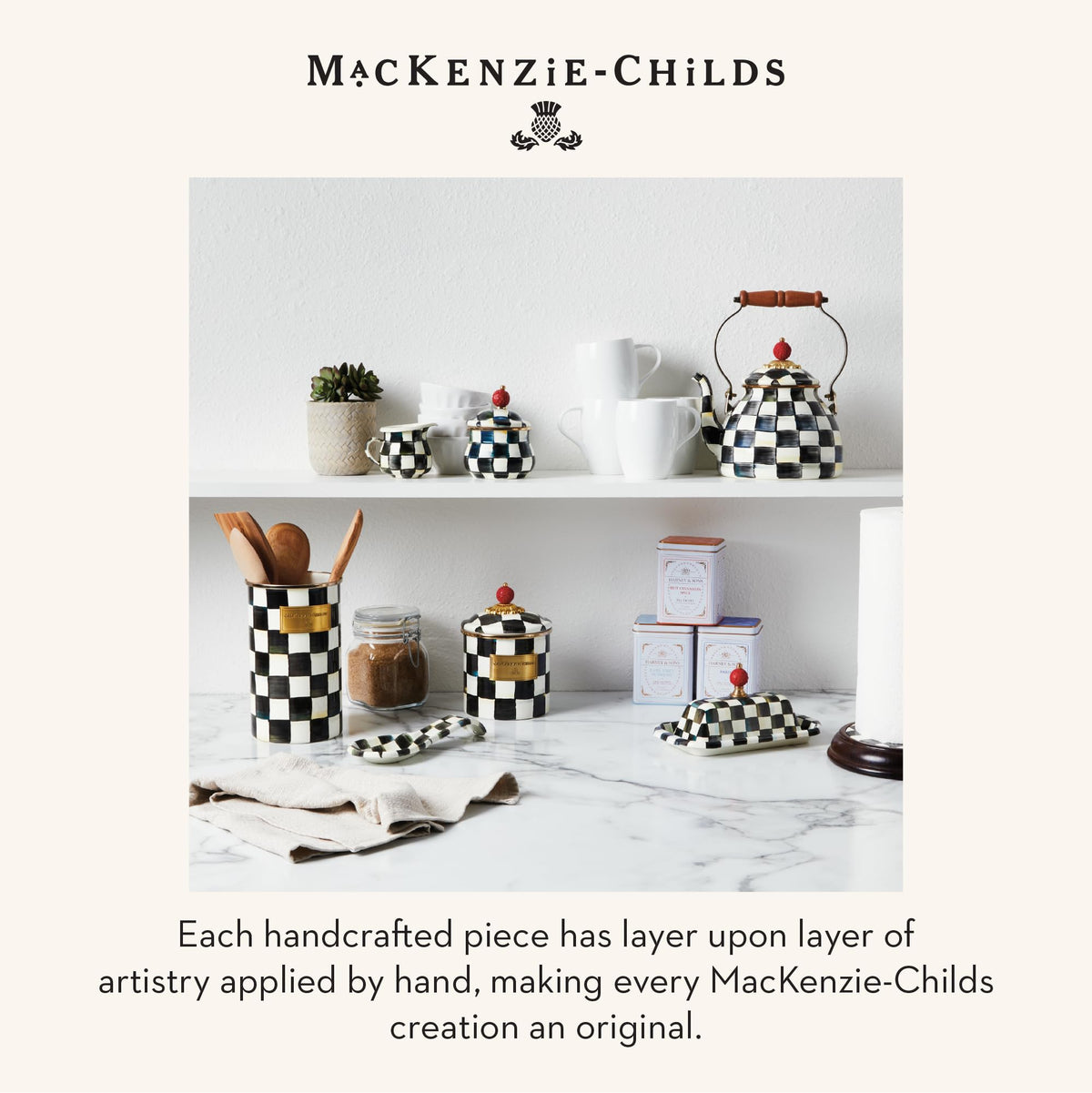 Full display of MacKenzie-Childs enamel utensil holder on counter