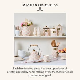 MACKENZIE-CHILDS enamelware decor enhances kitchen storage with whimsy.