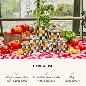 MacKenzie-Childs enamel canister set blends art and practical storage.