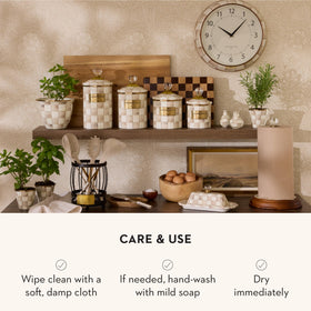 Gift-ready canister embodies MacKenzie-Childs heritage of joyful home pieces.