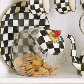 MacKenzie-Childs cookie jar with Courtly Check elevates everyday storage into a decorative centerpiece.
