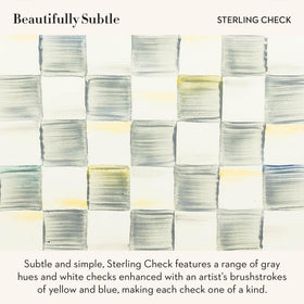 Mackenzie-Childs Sterling Check pattern adds timeless charm to kitchen decor.