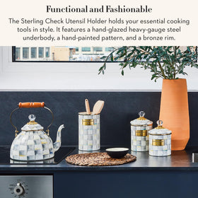 Mackenzie-Childs tall enamel utensil holder on countertop complements any kitchen decor.