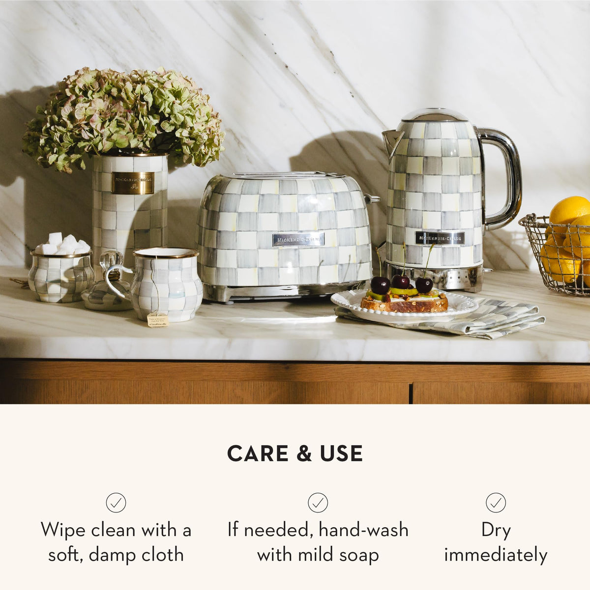 Mackenzie-Childs utensil holder on counter doubles as a stylish centerpiece.