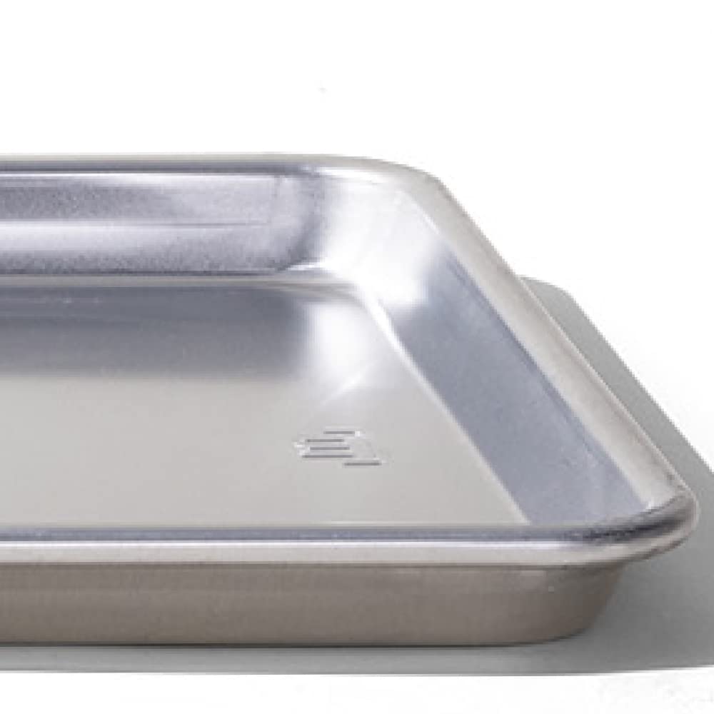 Made In Sheet Pan with salmon and vegetables for roasting meals.