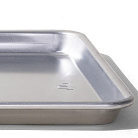 Made In Sheet Pan with salmon and vegetables for roasting meals.
