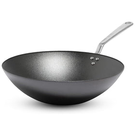 Made In 13-inch seasoned carbon steel wok top view for even searing.