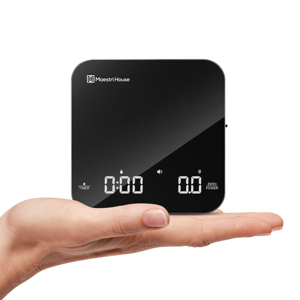Maestri House mini coffee scale with timer, compact palm-size design for portable espresso sessions.
