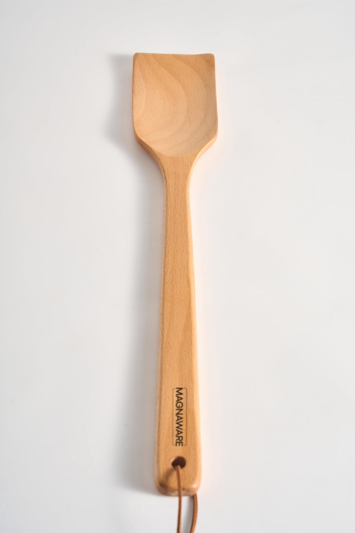 Magnaware easy-clean wooden spoon ideal for bulk cooking prep.