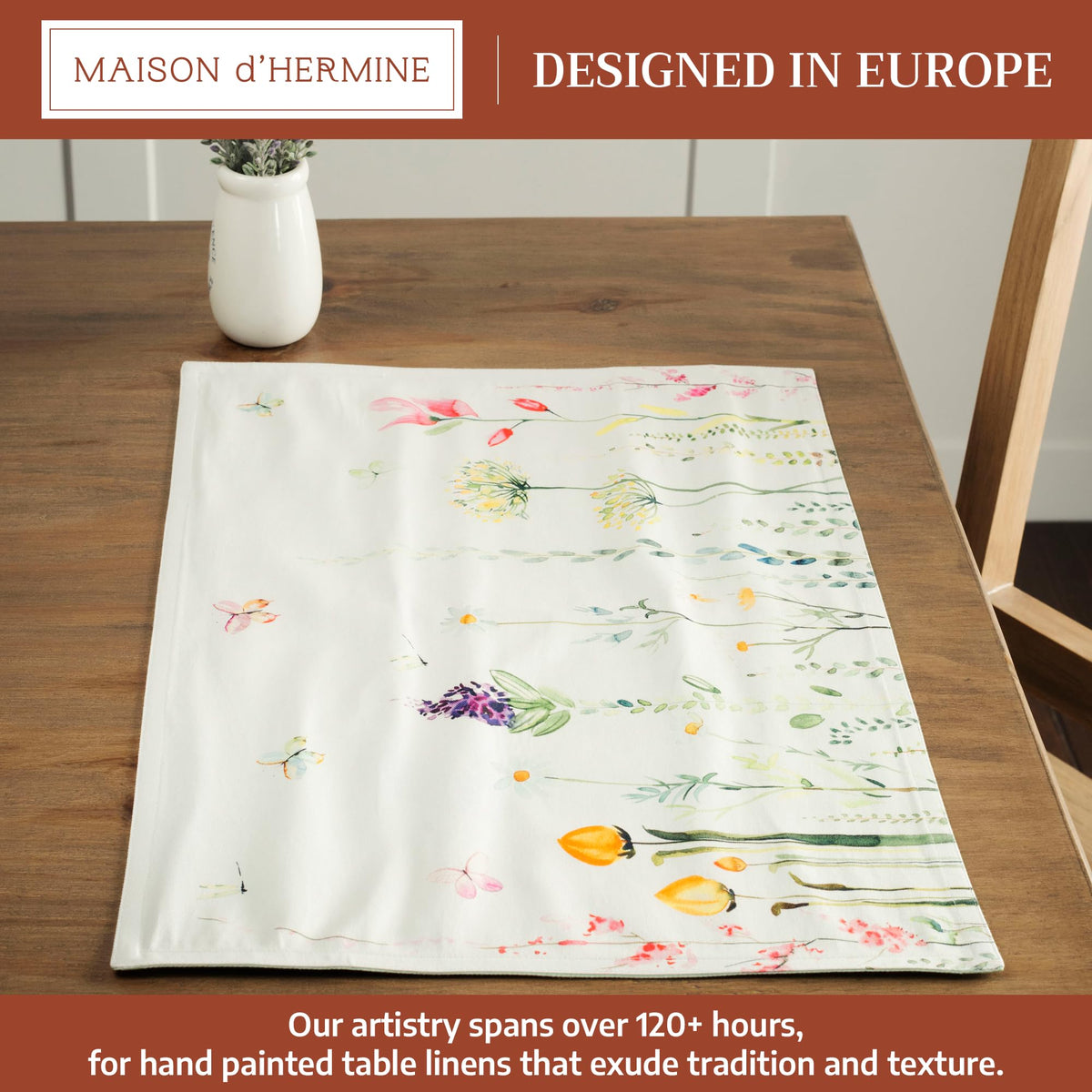Maison d'Hermine placemats feature hand-rendered watercolor artwork for an artistic table setting.