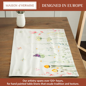 Maison d'Hermine placemats feature hand-rendered watercolor artwork for an artistic table setting.