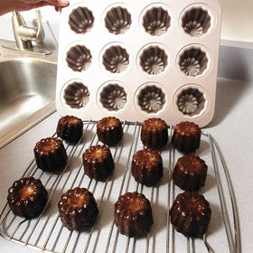 Top view of MAKABAKA The Love Canele Pan highlighting its 12-cup layout.