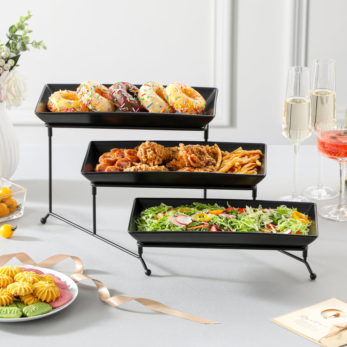 MALACASA cake and fruit setup on a stylish tiered stand