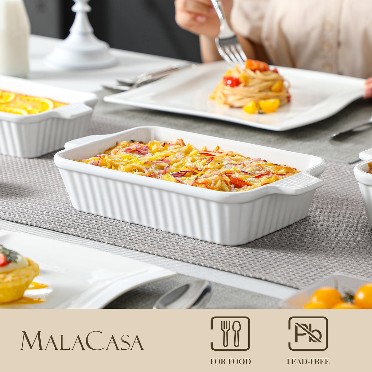 MALACASA bakeware with ergonomic handles ready to lift from oven.