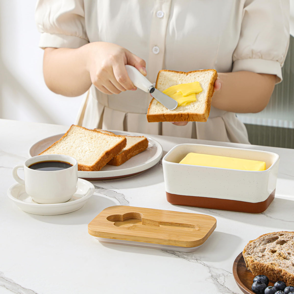 MALACASA Tara butter dish on dining table enhances kitchen ambiance