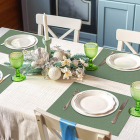 Sage green tone adds calming farmhouse feel to dining space