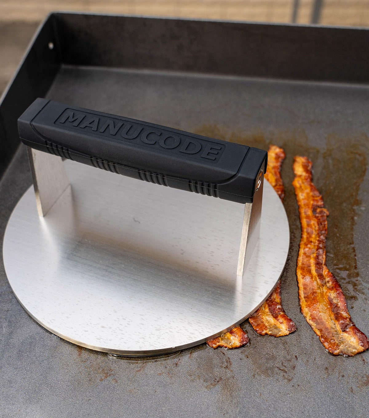 Manucode skillet splatter reduction with the burger press