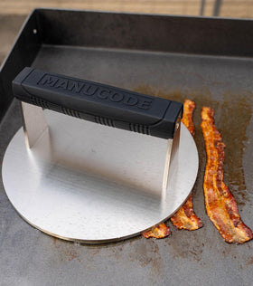 Manucode skillet splatter reduction with the burger press