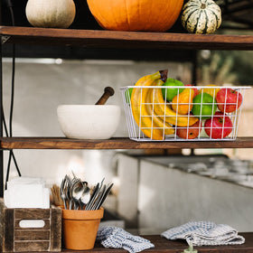 MaraFansie bathroom wall basket keeps towels and essentials within reach.