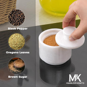 MARBLOUS KRAFTS marble salt cellar being wiped for easy cleaning
