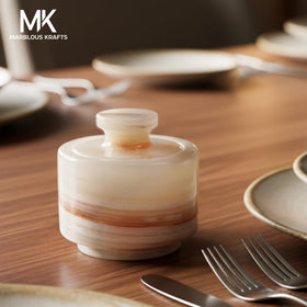 Marblous Krafts marble salt cellar with lid open for easy scooping.