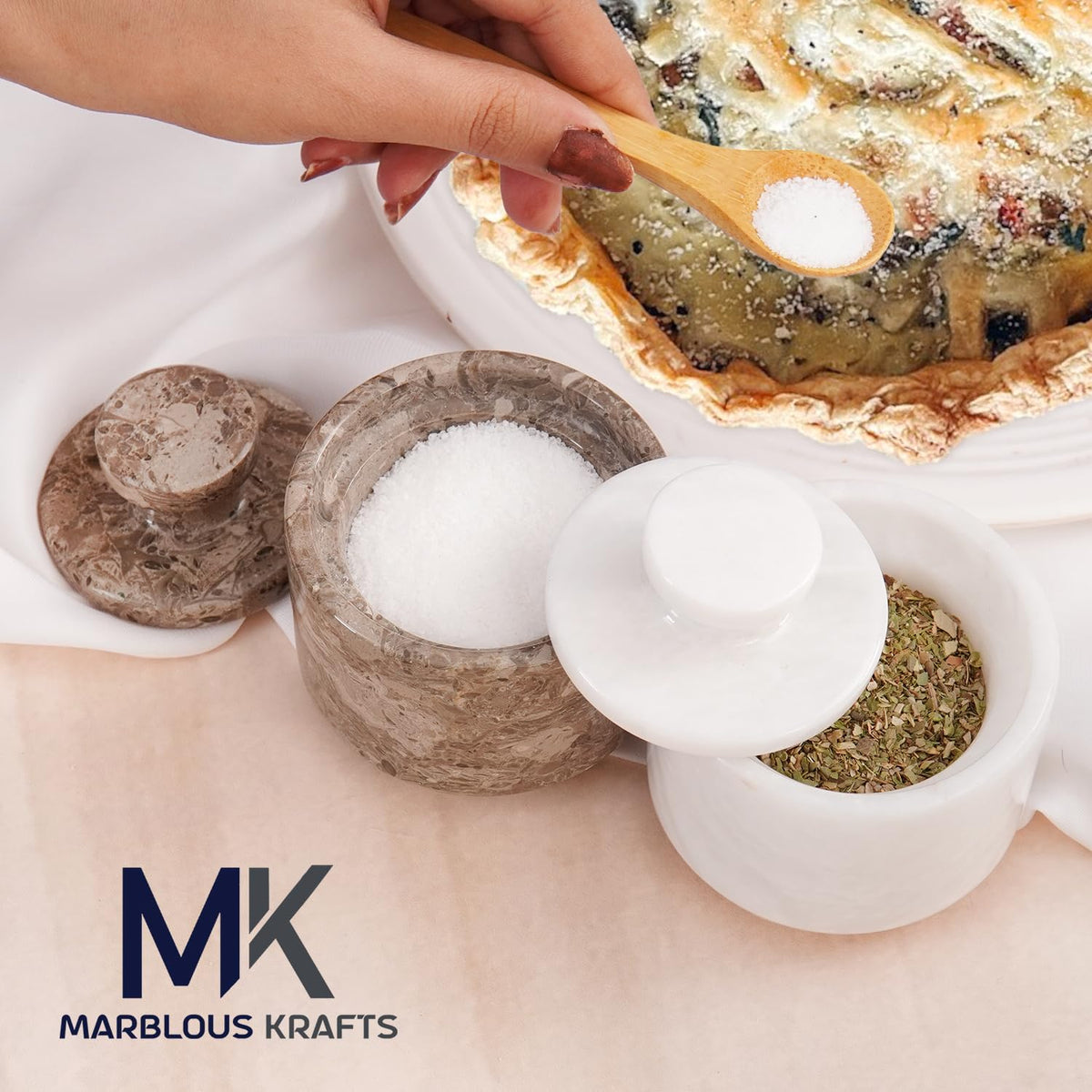 Close-up shows natural marble veining in MARBLOUS KRAFTS salt cellar for timeless decor.