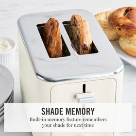 Martha Stewart 2-Slice Toaster self-centering slots ensure even browning