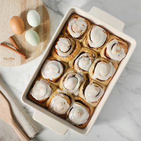 Sturdy side handles provide a safe grip for transferring from oven to table.