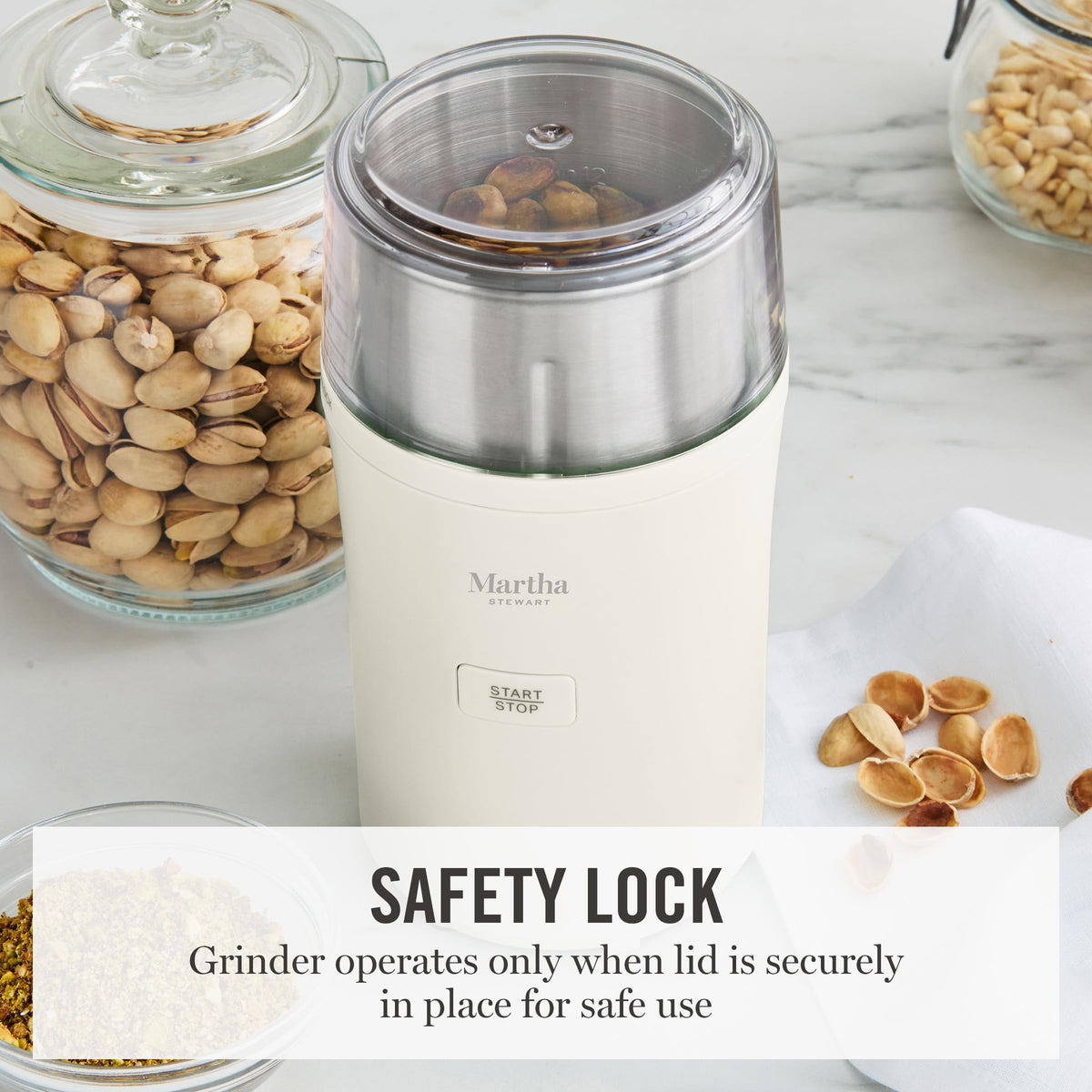 Compact storage design of Martha Stewart grinder keeps bowls neatly stacked.