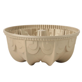 Martha Stewart Dunelle champagne-finish product close-up suggests refined bakeware for celebrations.