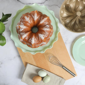 Martha Stewart Dunelle side view highlights champagne nonstick interior for easy cake release.