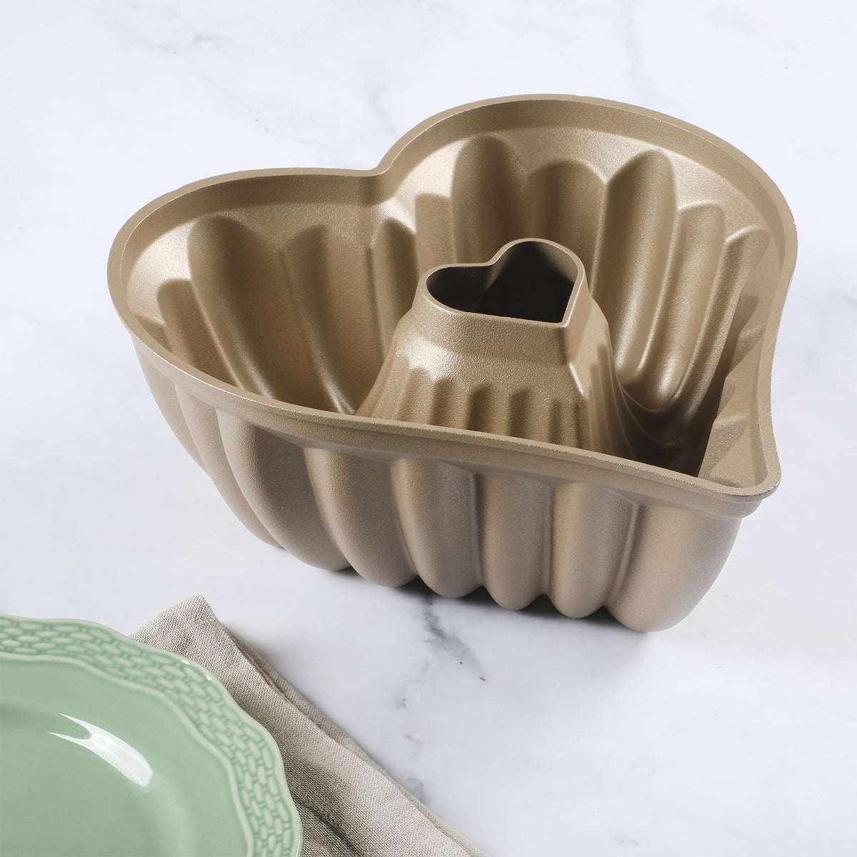 Martha Stewart Dunelle mold, oven safe and sturdy cast aluminum construction