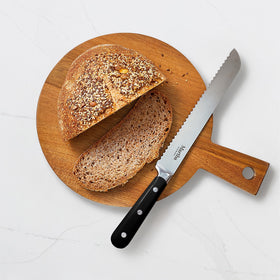 Martha Stewart Eastwalk acacia wood block; safe blade storage with warm natural appeal.