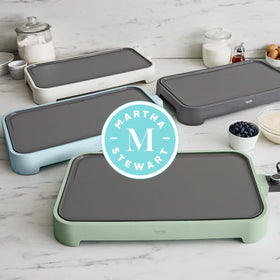 Pancakes and eggs cooking on Martha Stewart griddle's large surface