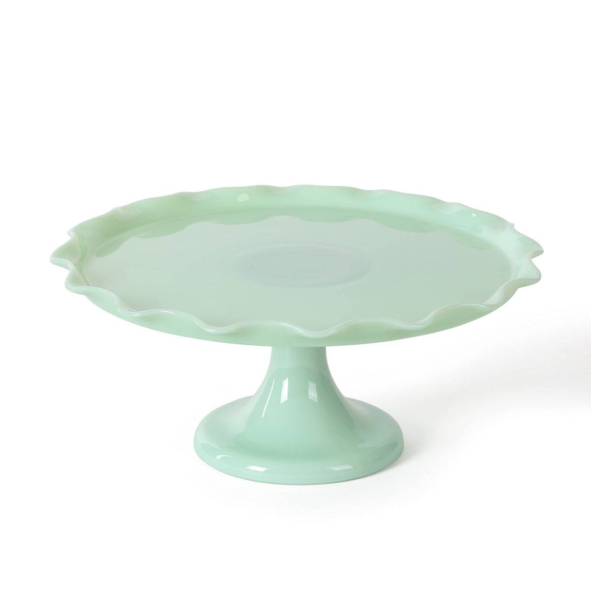 Martha Stewart Highbrook jadeite cake stand with ruffle trim for elegant dessert display.