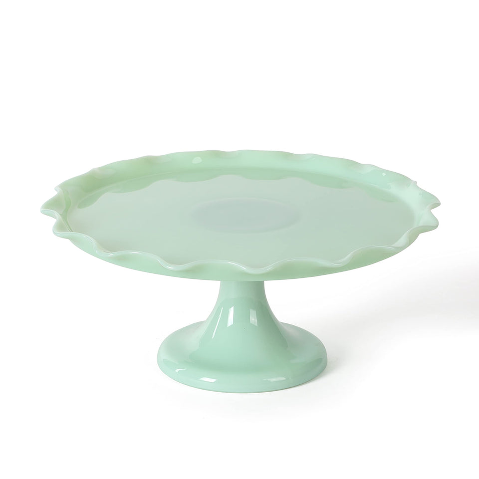 Martha Stewart Highbrook jadeite cake stand with ruffle trim for elegant dessert display.