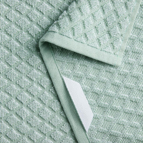Martha Stewart Honeycomb Chambray towel with hanging loop, ideal for drying.
