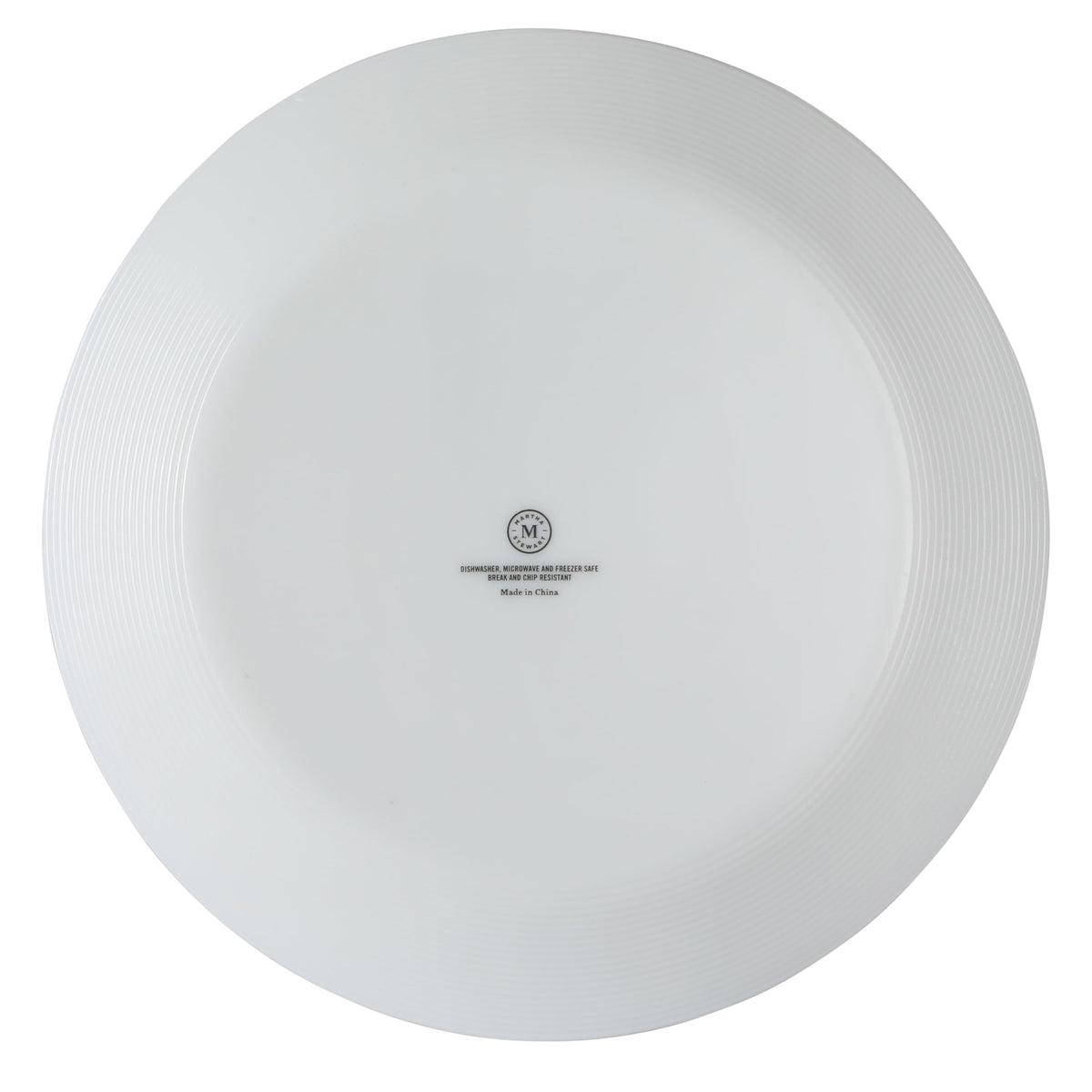 Martha Stewart Opalton plates sit stylishly on a clean, modern table.