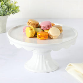 Patterson stand highlighting a delicate ruffled edge on a white stoneware platter.