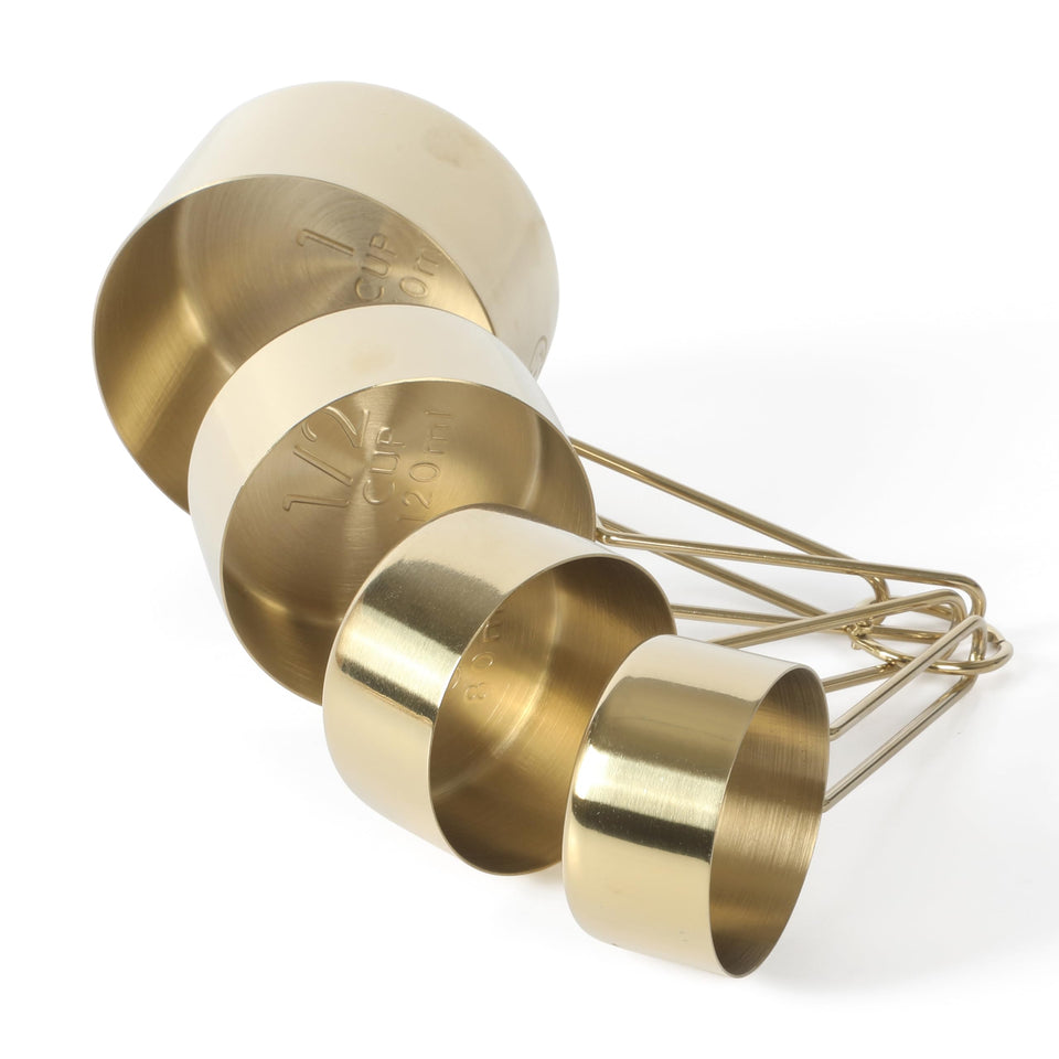 Martha Stewart Richburn gold measuring cups set, complete for precise baking measurements and easy storage.