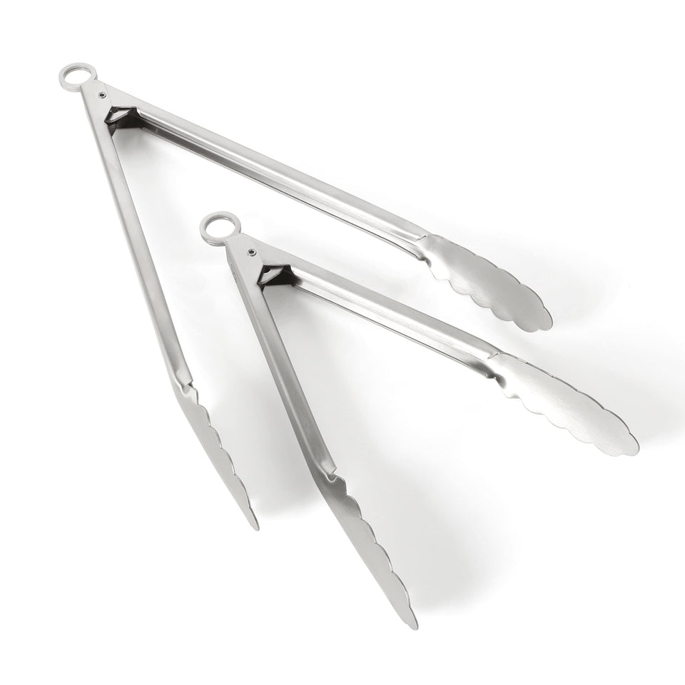 Martha Stewart Richburn 9-inch tong in use for grilling with a precise grip.