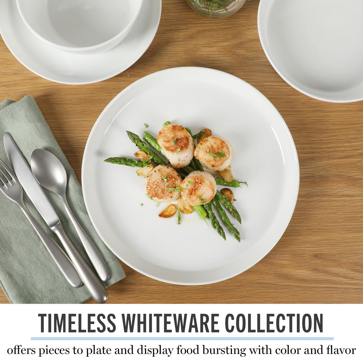 Martha Stewart Selma coupe-edge dinnerware creates a minimalist or dramatic table focus.