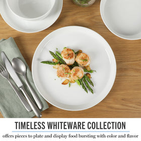Martha Stewart Selma coupe-edge dinnerware creates a minimalist or dramatic table focus.