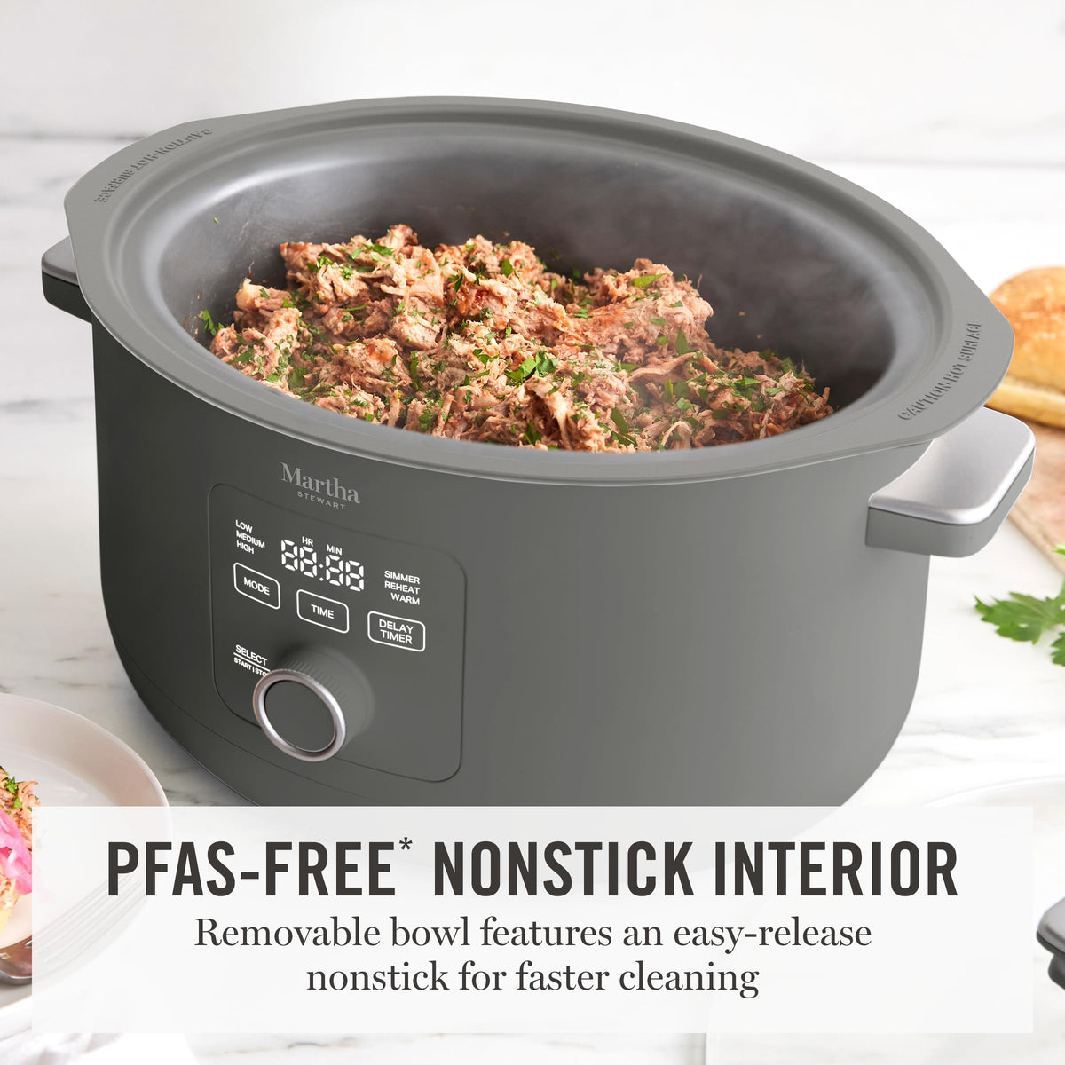 Martha Stewart slow cooker displaying six cooking modes for versatility.